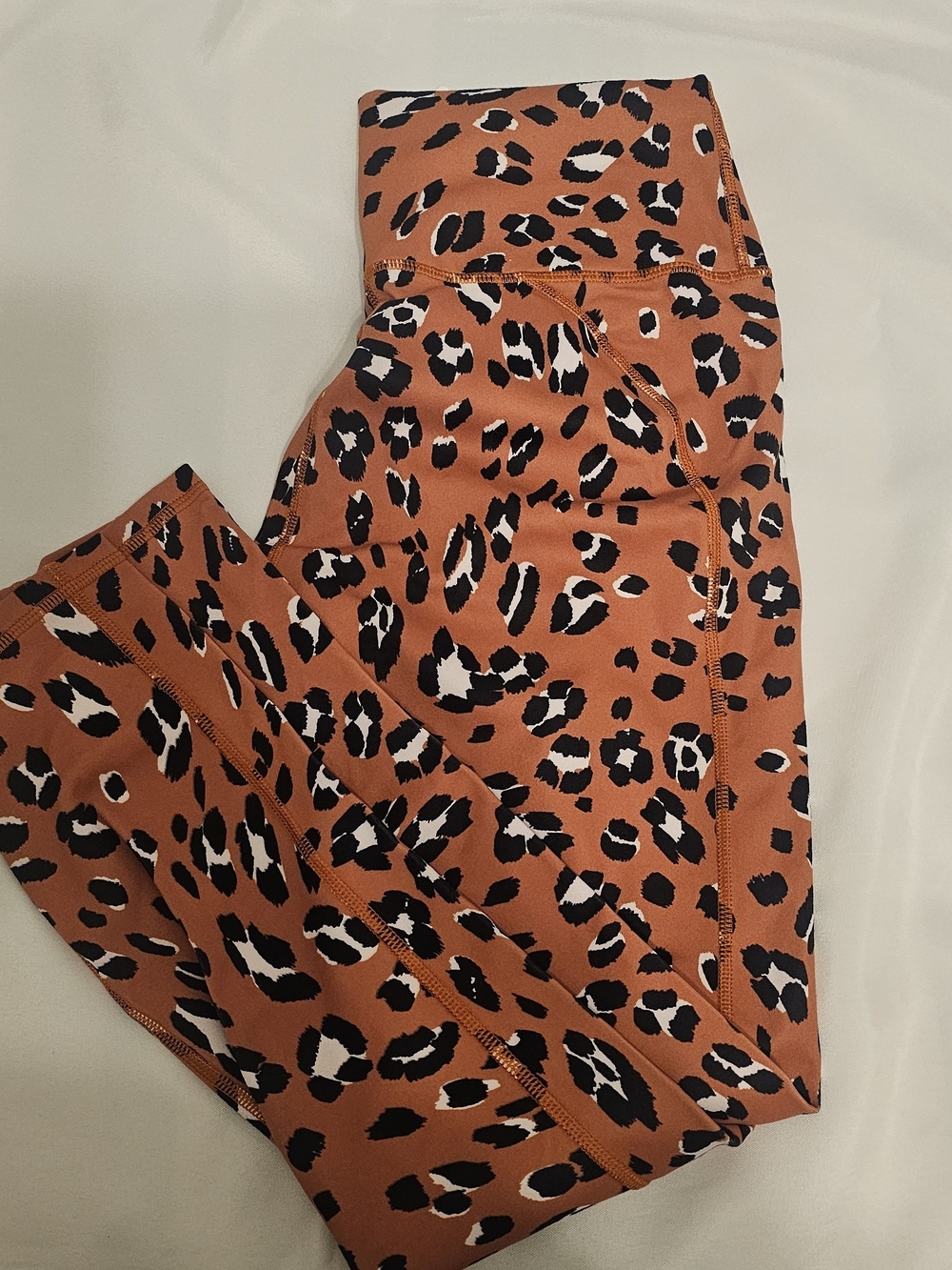 Fabletics Rust Leopard-Print Leggings with Black & White Spots
